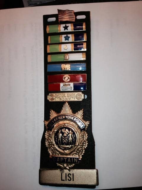 Lisi’s Captain’s Shield &amp; NYPD Decorations. Notice the USMC Service Bar (red). Photo courtesy of Joe Lisi.