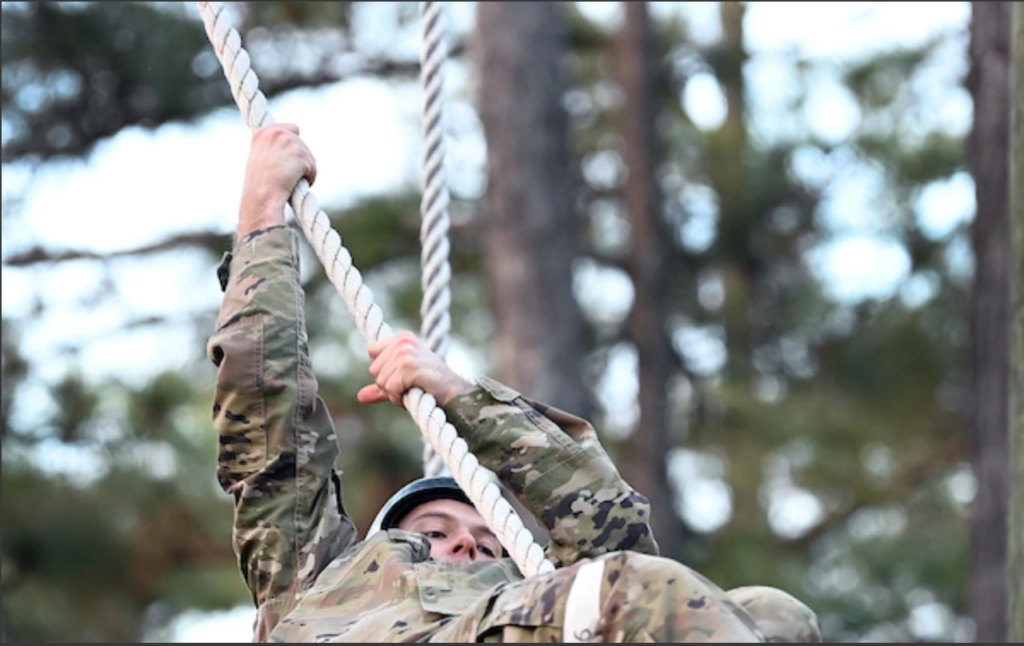 soldier climbing rope