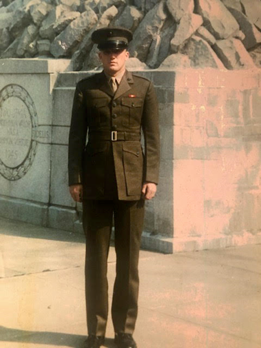 Doman at the Marine Corps of an Iwo Jima Memorial statue. Phot courtesy of John Doman.