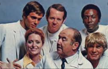 Farrell (back center) with the cast of <em>The Interns</em> with Broderick Crawford (bottom center). Photo courtesy of Famousfix.com.