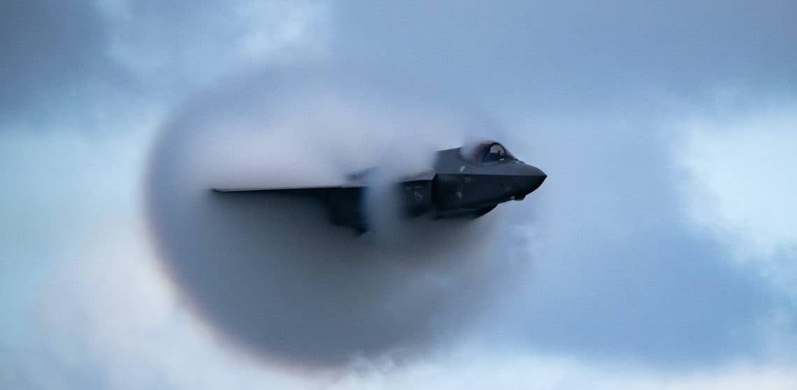 U.S. Air Force Capt. Kristin "BEO" Wolfe, F-35 Lightning II Demonstration Team commander and pilot, performs the "high-speed pass" maneuver at the 2020 Fort Lauderdale Air Show Nov. 22, 2020, Fort Lauderdale, Florida. During this maneuver, the jet flies at approximately .95 mach, which is just below the speed of sound at approximately 728 miles per hour. (U.S. Air Force photo by Capt. Kip Sumner)