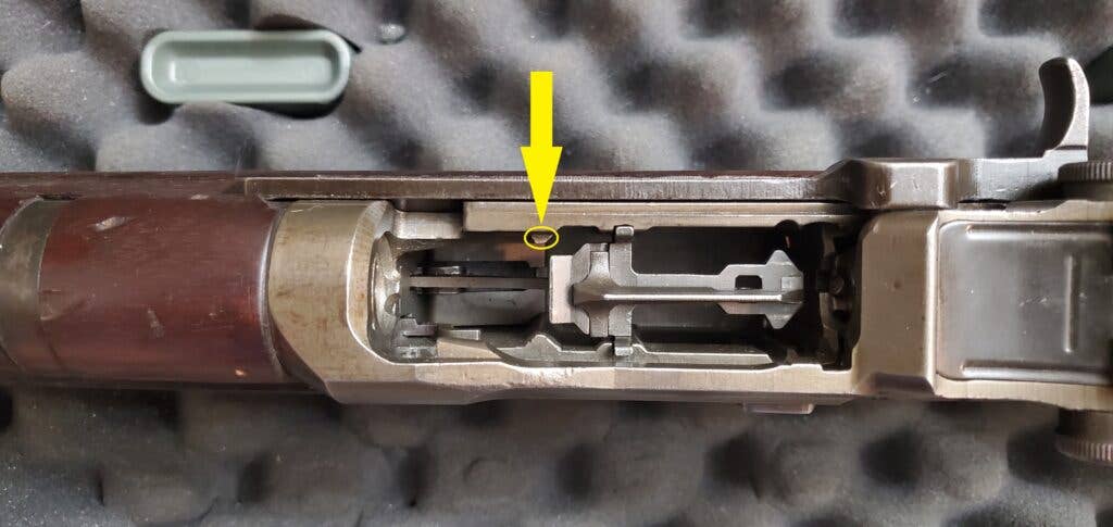 <em>The guide rail nub circled in yellow that must remain intact to prevent the jam (Miguel Ortiz)</em>