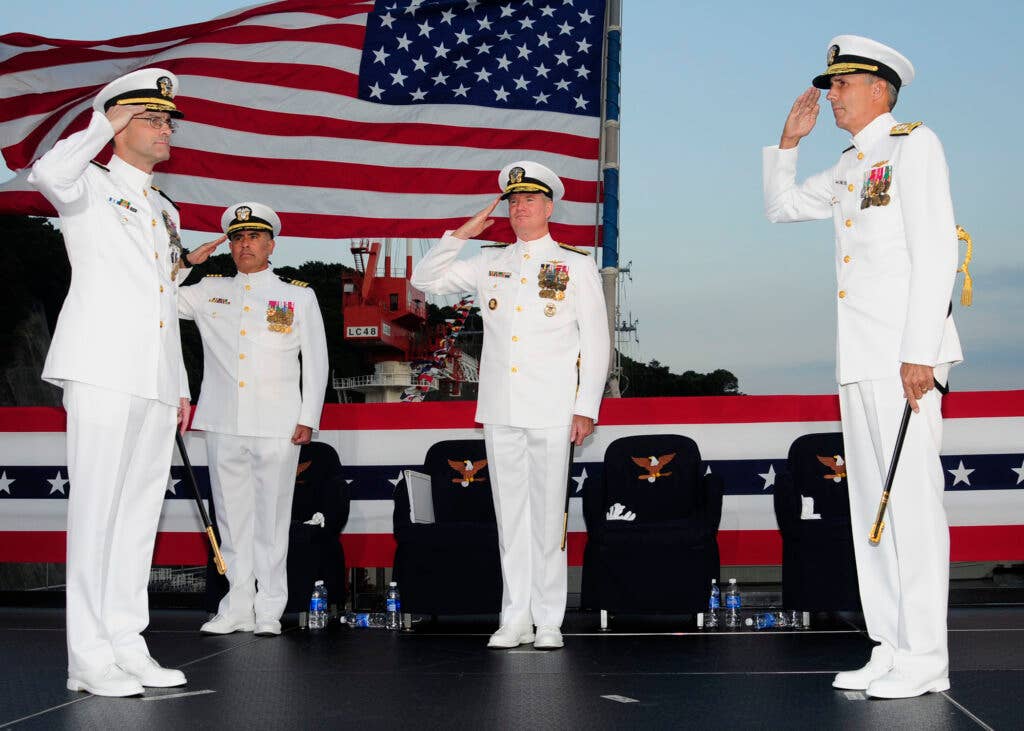 Vice Adm. Scott R. Van Buskirk, right, relieves Vice Adm. John M. Bird as commander of U.S. 7th Fleet during a change of command ceremony a board the amphibious command ship command USS Blue ridge. Van Buskirk is the 47th commander of U.S. 7th Fleet. U.S. 7th Fleet is responsible for the largest area of the Navy's numbered fleets and operates in the western Pacific and Indian Oceans.