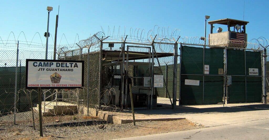 The entrance to Camp 1 in Guantanamo Bay's Camp Delta. The base's detention camps are numbered based on the order in which they were built, not their order of precedence or level of security. Photo by Kathleen T. Rhem (<a href="https://commons.wikimedia.org/wiki/File:Camp_Delta,_Guantanamo_Bay,_Cuba.jpg" target="_blank" rel="noreferrer noopener">Wikimedia Commons</a>)