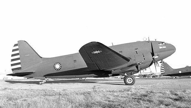 curtiss c-46 ashot down japanese fighter over Himalayas