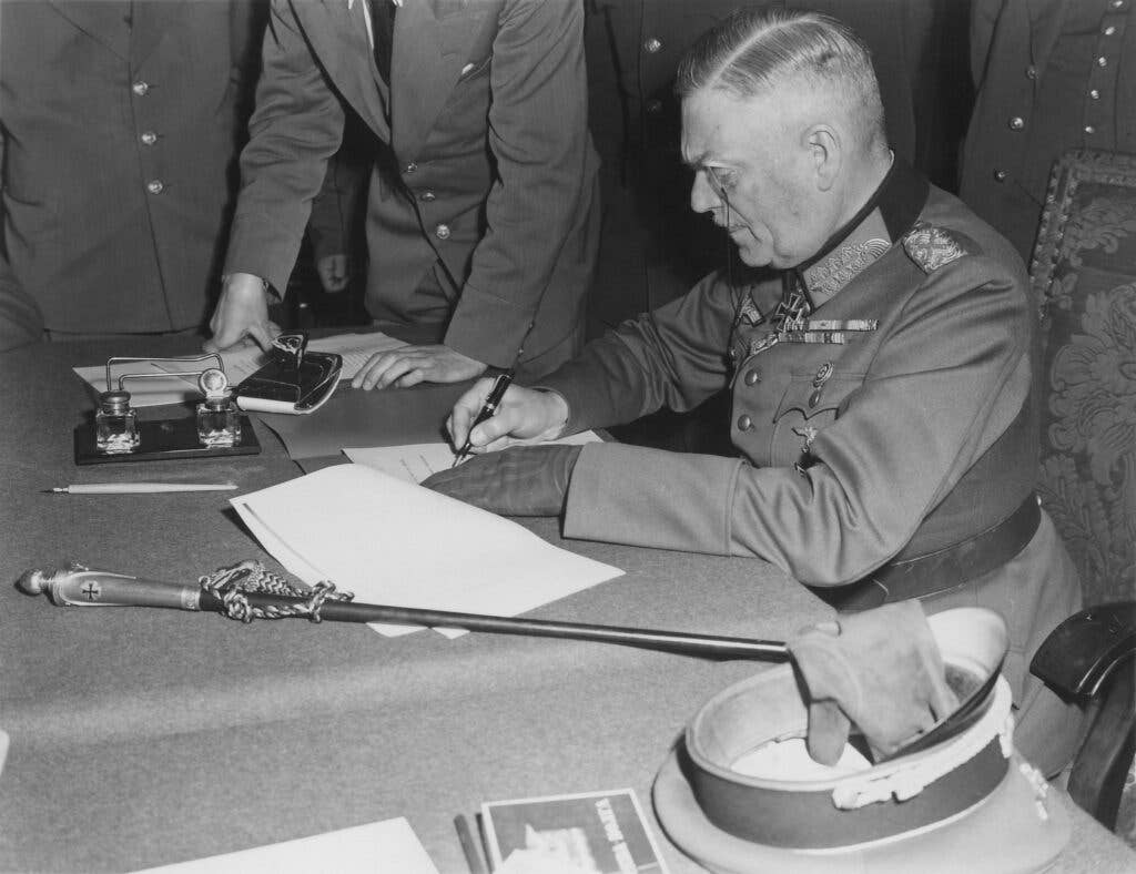 Keitel signs the surrender (National Records and Archives)