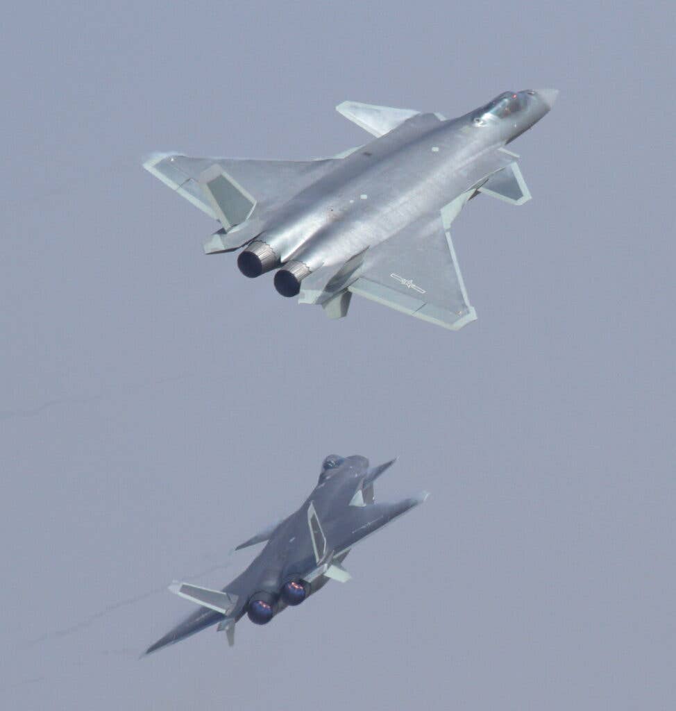 Two J-20s in flight at Airshow China in 2016 (Wikimedia Commons)
