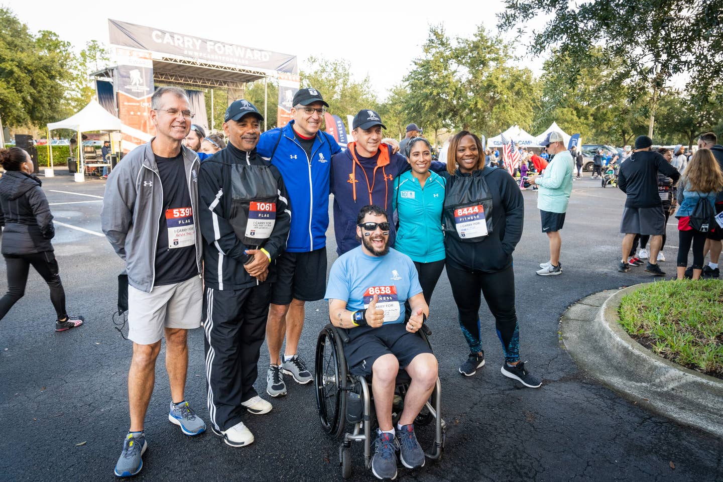 Linnington (middle, blue jacket) at a WWP event. Photo credit Wounded Warrior Project.