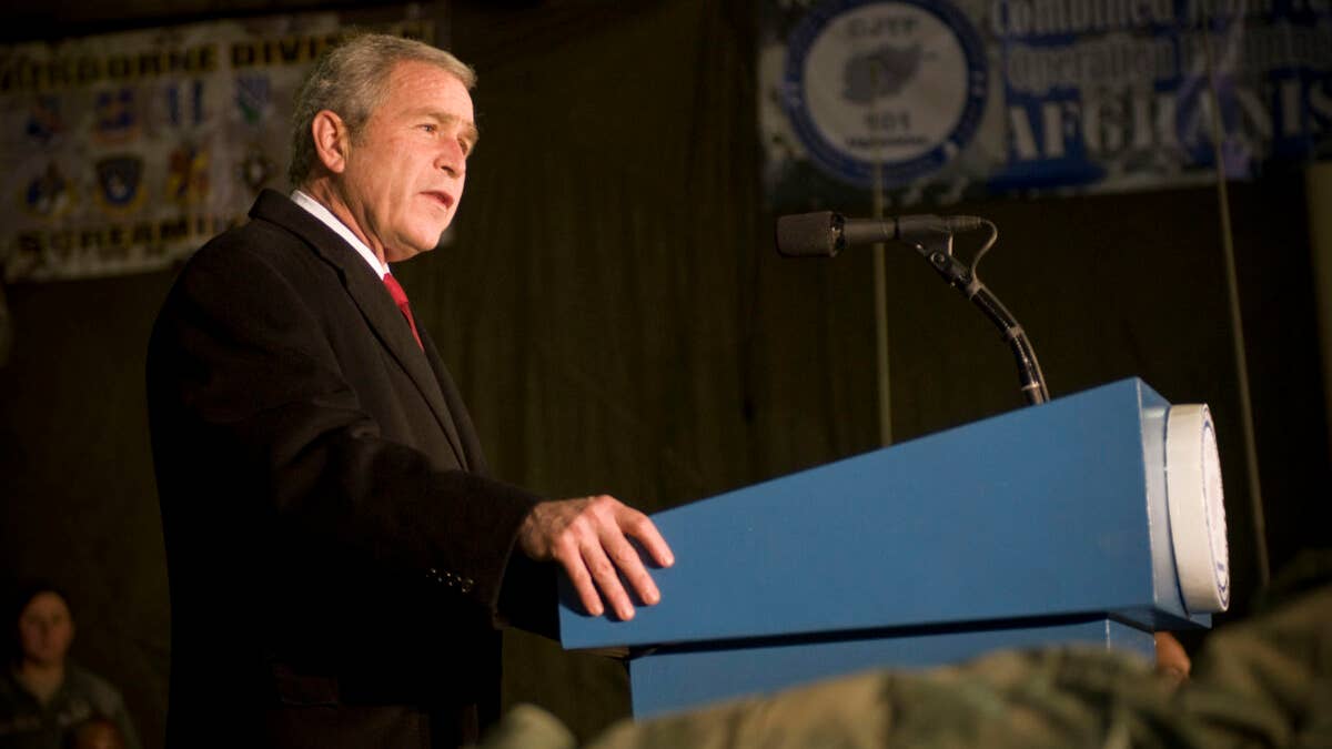 President George W. Bush gives a speech to a crowd of military personnel and civilians gathered at Bagram Air Field, Afghanistan, Dec. 15. On his last tour through Afghanistan, President Bush thanked all the deployed troops for their hard work and dedication. (U.S. Air Force photo by Staff Sgt. Samuel Morse)(Released)