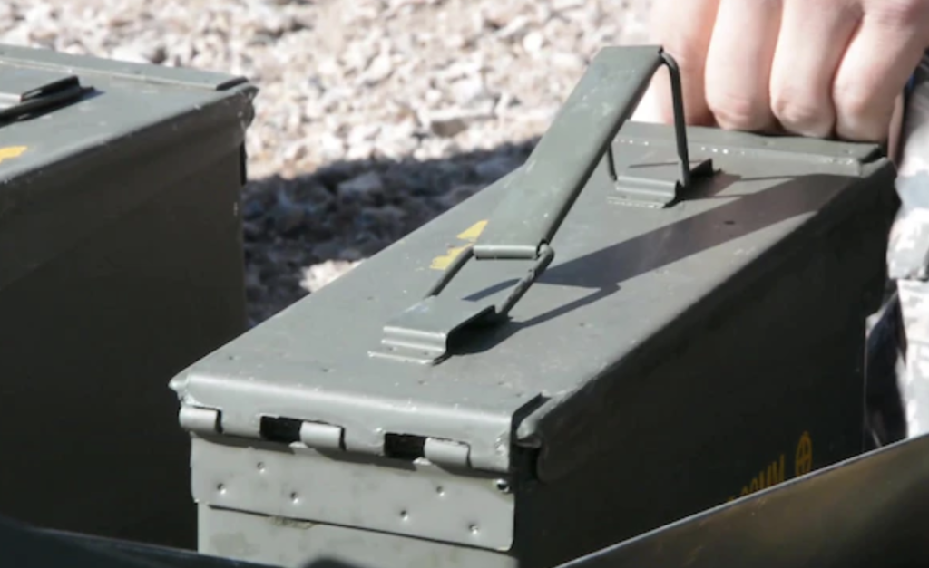 A military ammo box in traditional olive drab.&nbsp;
