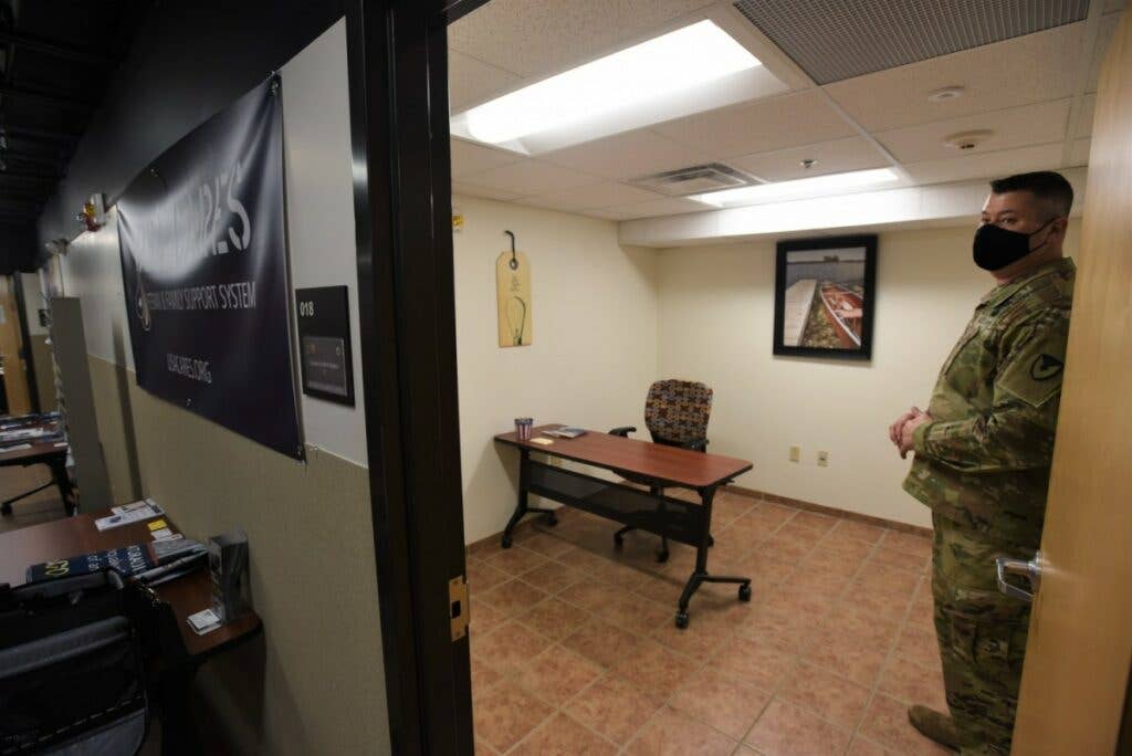 Command Sgt. Maj. William Fogle, senior enlisted advisor at Fort Knox Garrison, provides a look at one of five offices that Fort Knox will soon be providing for spouses who want a work space outside the home.&nbsp;(Eric Pilgrim, Fort Knox News)<br>