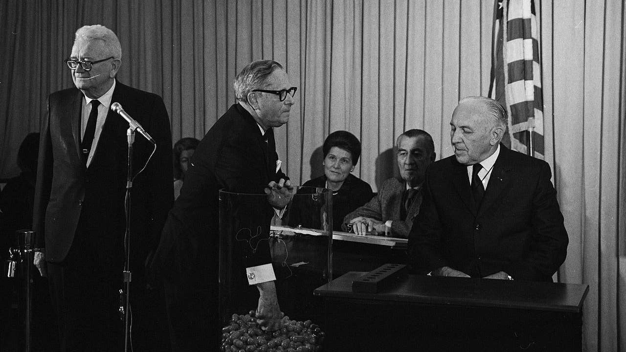 Congressman Alexander Pirnie (R-NY) drawing the first capsule for the Selective Service draft, Dec 1, 1969. This image was copied from [1], which credits the photo to "Selective Service System". I'm tentatively assuming that since the photo was created by a federal agency, it cannot by copyrighted. I'm going to post a message on copyvio to get clarification before I link an article to the image. (Wikimedia Commons)
