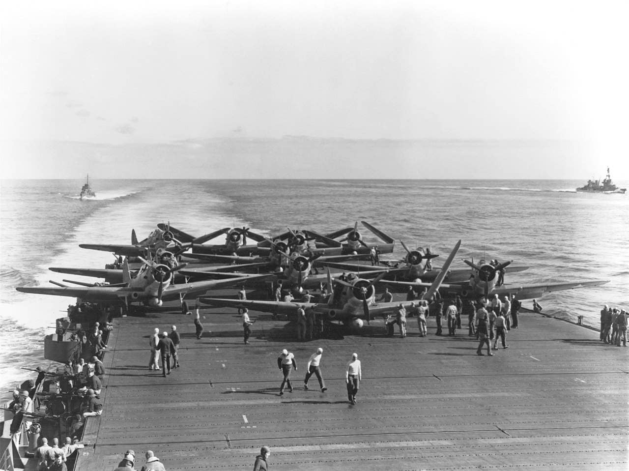 U.S. Navy Torpedo Squadron 6 (VT-6) Douglas TBD-1 Devastator aircraft are prepared for launching aboard the aircraft carrier USS Enterprise (CV-6) at about 0730-0740 hrs, 4 June 1942. (Wikimedia Commons)