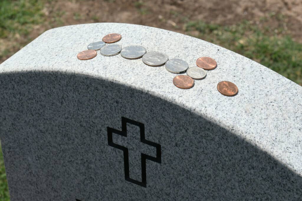 coins on grave