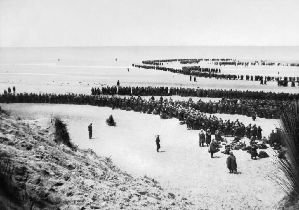 British troops awaiting evacuation on the beach, where Lacey didn't make it in time (Imperial War Museum)