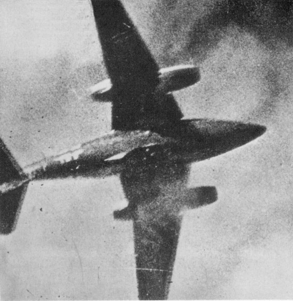 An Me-262 being shot down, seen from gun camera of a P-51 pilot <br>(U.S. Army Air Force)