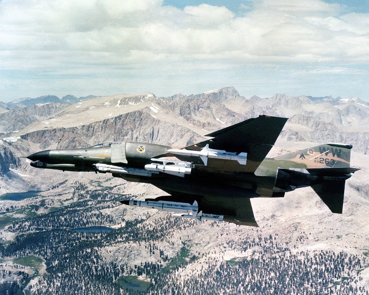 An F-4G Phantom II aircraft shows its undercarriage holding four different missiles: one each AGM-45, AGM-65, AGM-78, and AGM-88. (Wikimedia Commons)