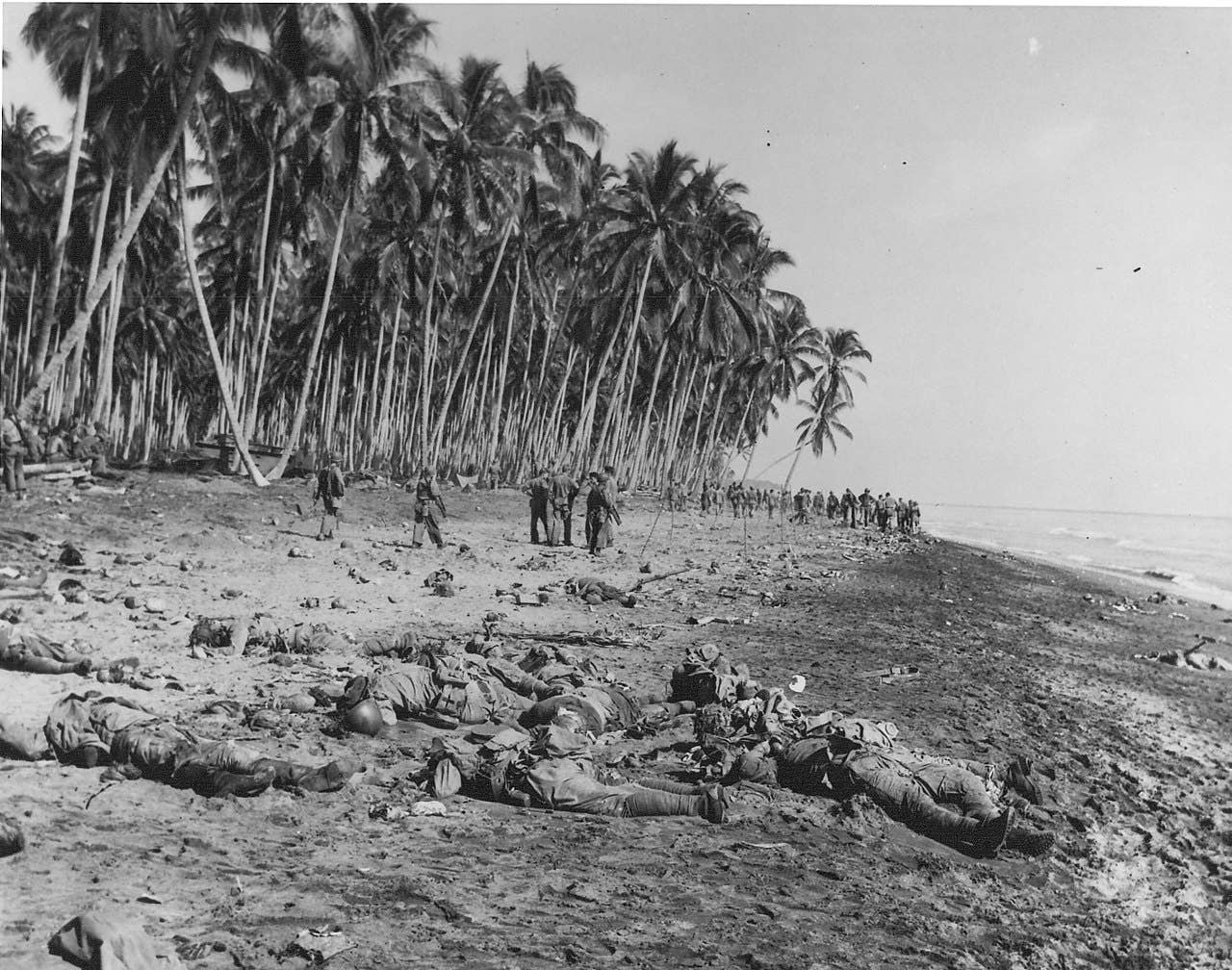 Deceased Japanese soldiers lie on the sandbar at the mouth of Alligator Creek on Guadalcanal on 21 August 1942 after being killed by U.S. Marines during the Battle of the Tenaru. (Wikimedia Commons)