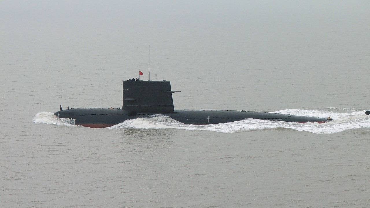 A Chinese diesel submarine surfaced in the middle of a US carrier group