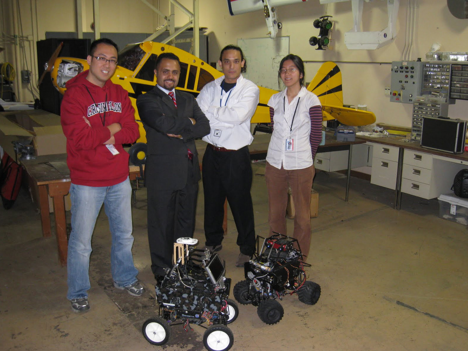 From left to right: Ritchie Lee, CMU; Khalid Al-Ali, Senseta; Corey Ippolito, NASA; Yoohsiu Yeh, CMU. (NASA)