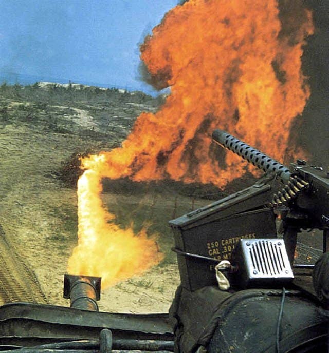 1st Marine Division: A US Marine Corps M67 flame-thrower tank in Vietnam. An M1919A4 MG is mounted on the commander's cupola to the right.<br>Original caption: Flame tank in action spraying its deadly napalm. (USMC Photo)