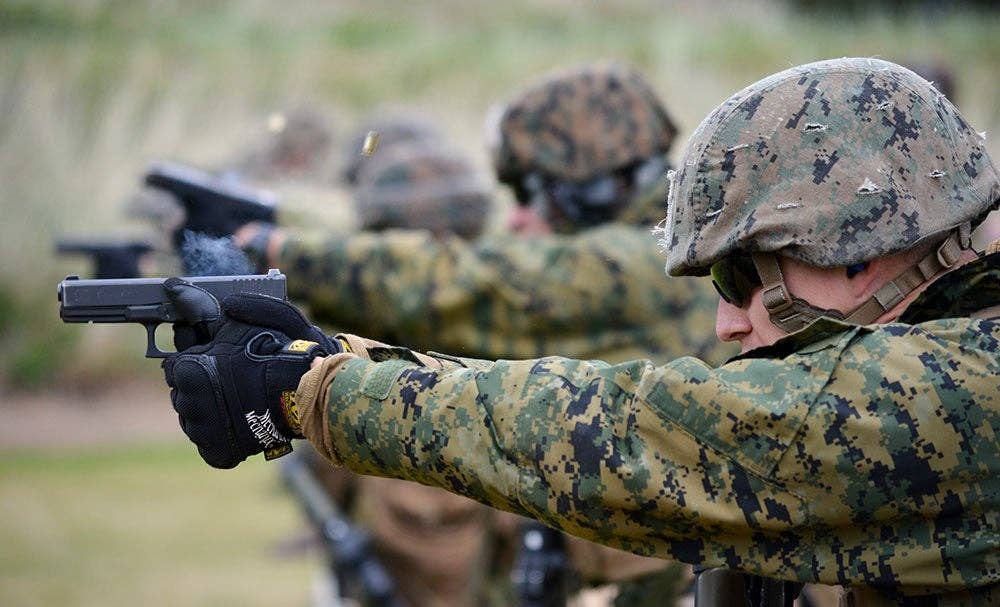 <em>Marines train with British Army Glock 17s (U.S. Marine Corps)</em>
