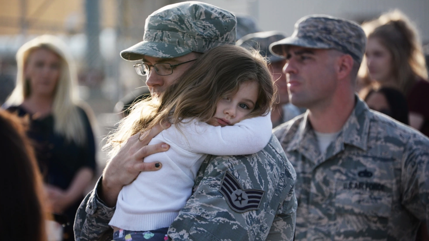 U.S. Airman hugs his daughter goodbye. (U.S. Air Force photo by Airman 1st Class Giovanni Sims)