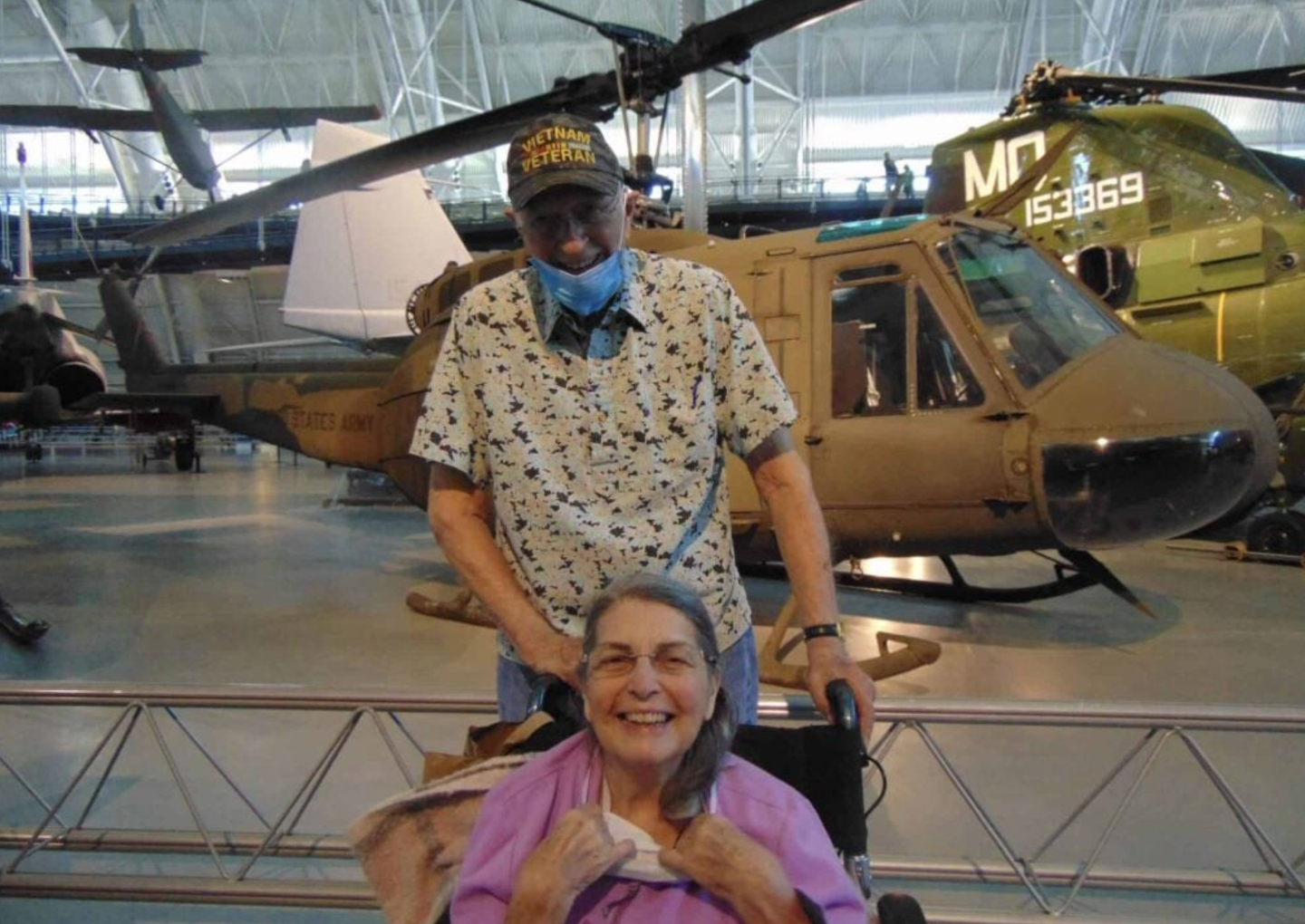 Raydean (85) and Mickey (83) at the Udvar-Hazy Center in front of Raydean's old Huey (IntegraCare/Hunters Woods at Trails Edge)