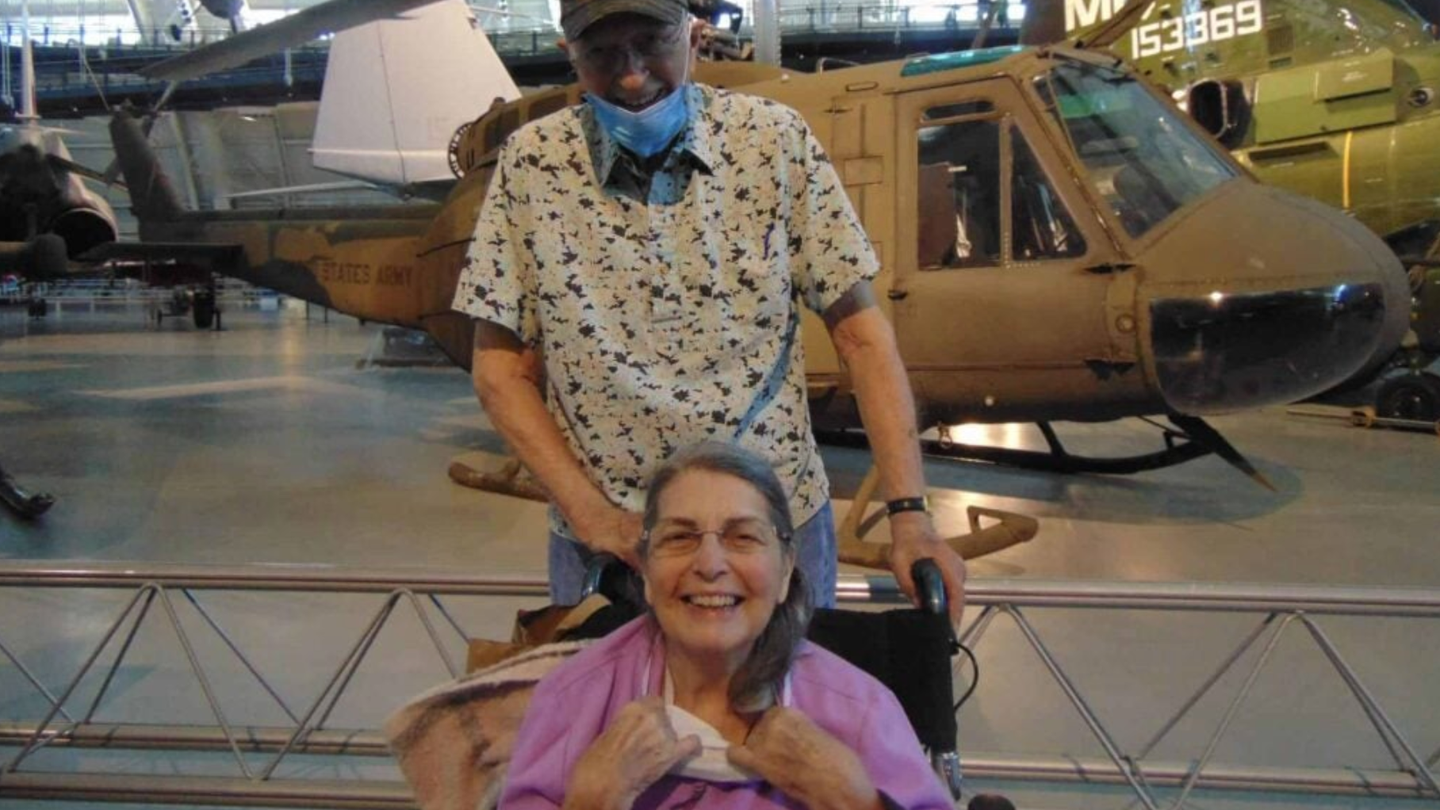 Raydean (85) and Mickey (83) at the Udvar-Hazy Center in front of Raydean's old Huey (IntegraCare/Hunters Woods at Trails Edge)