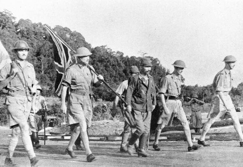 Lieutenant-General Percival and his party carry the Union flag on their way to surrender Singapore to the Japanese. (Wikimedia Commons)