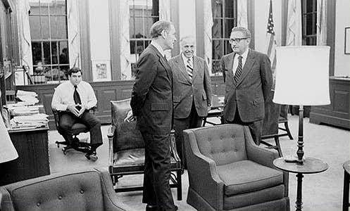 On Thursday, August 8, 1974, Nixon announced his resignation at 9 PM on national television. Afterward, White House staff contemplated the fallout. From left, George Joulwan, a special assistant to the president, Chief of Staff Alexander Haig, Special Counsel to the President for Watergate James St. Clair, Secretary of State Henry Kissinger. (Wikimedia Commons)