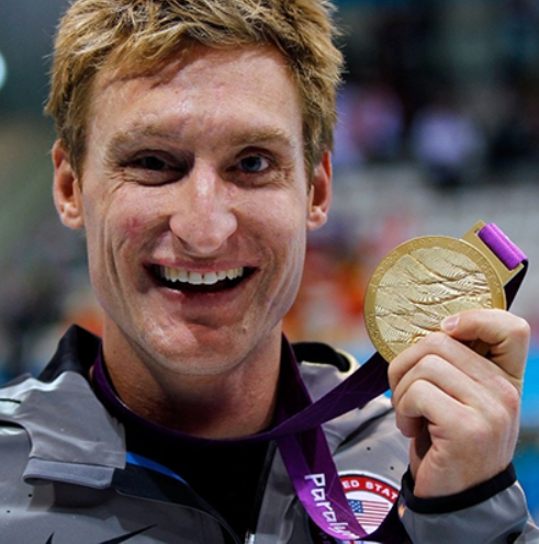 Snyder holding one of his Olympic gold medals. (Photo courtesy of the Pat Tillman Foundation)