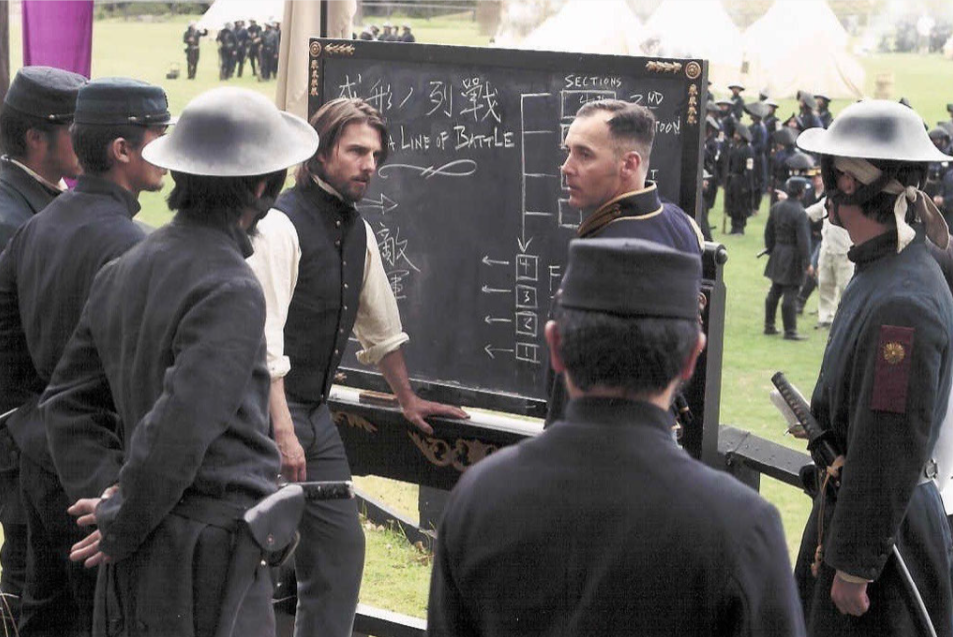 Dever (right) on set with Tom Cruise (left) on the set of The Last Samurai. Photo courtesy of Jim Dever.