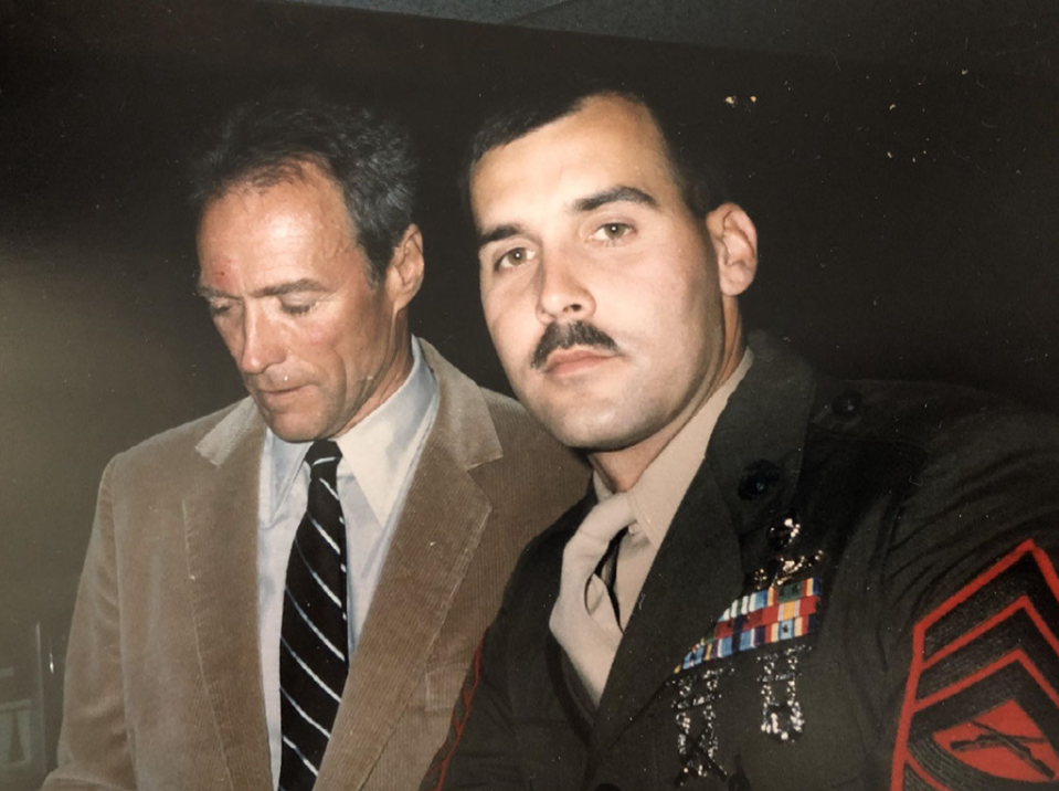Dever (right) and Clint Eastwood (left) pose for a photo while working on <em>Heartbreak Ridge</em>. Photo courtesy of Jim Dever.