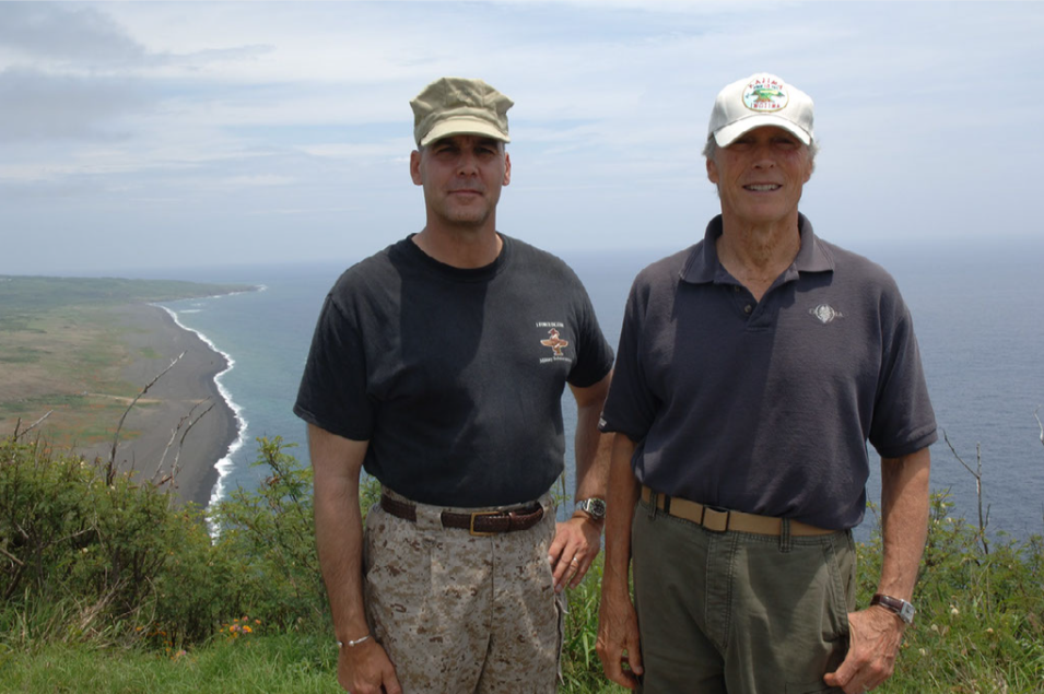 Dever (left) and Eastwood (right) pose for a photo during the filming of <em>Letters from Iwo Jima</em>. Photo courtesy of Jim Dever.