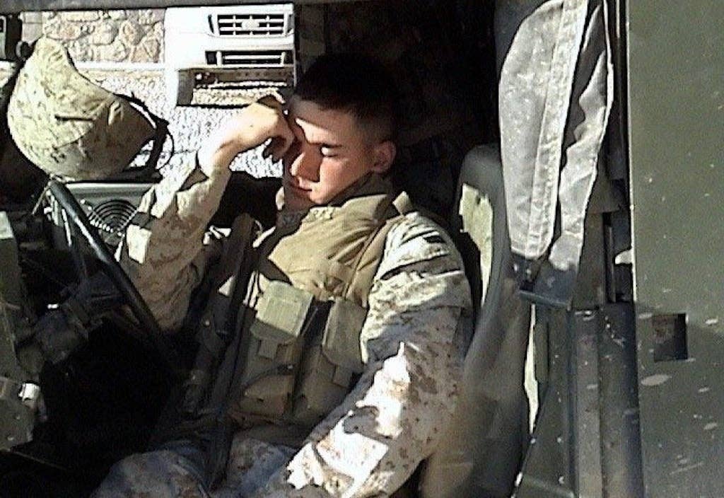 infantryman sleeping in truck