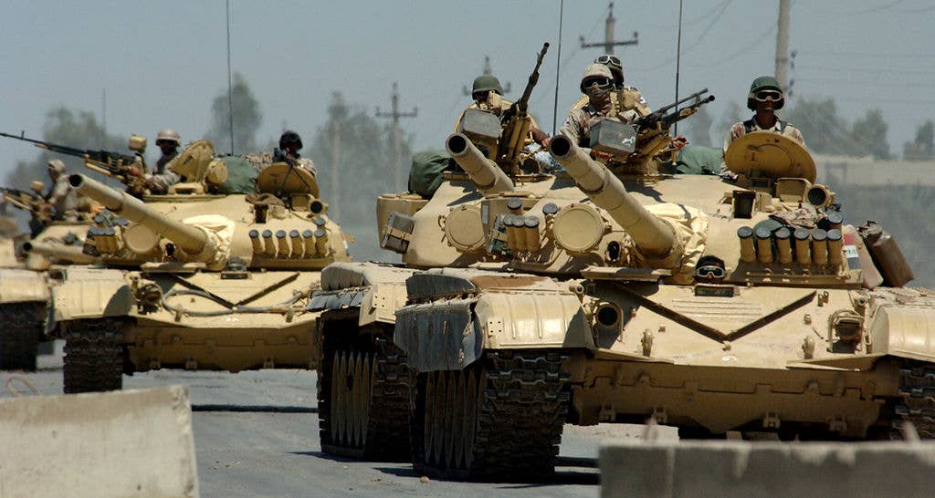 Desert Storm did not go well for Iraq. Iraqi tanks assigned to the Iraqi Army 9th Mechanized Division drive through a checkpoint near Forward Operating Base Camp Taji, Iraq. (Wikipedia)
