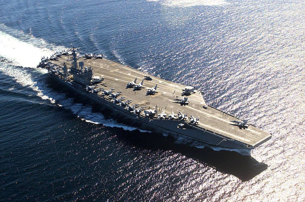 USS <em>Nimitz</em> (CVN-68), a US Navy aircraft carrier in Victoria, Canada. Photo is from after her 1999-2001 refit. (Wikimedia Commons)