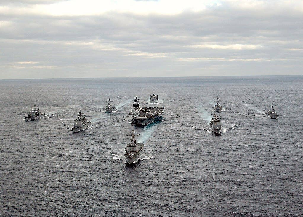 Atlantic Ocean (Nov. 30, 2003) -- USS George Washington (CVN 73) Carrier Strike Group formation sails in the Atlantic Ocean. Washington is conducting Composite Training Unit Exercise (COMPTUEX) in preparation for their upcoming deployment. U.S Navy photo by Photographer's Mate 2nd Class Summer M. Anderson. (RELEASED)