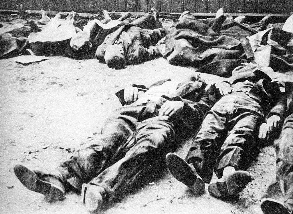 Polish civilians murdered by German troops during Warsaw Uprising. Photo taken in Warsaw's district Wola where SS troops murdered about 60 000 people during so called "Wola massacre" (first days of August 1944). (Wikimedia Commons)