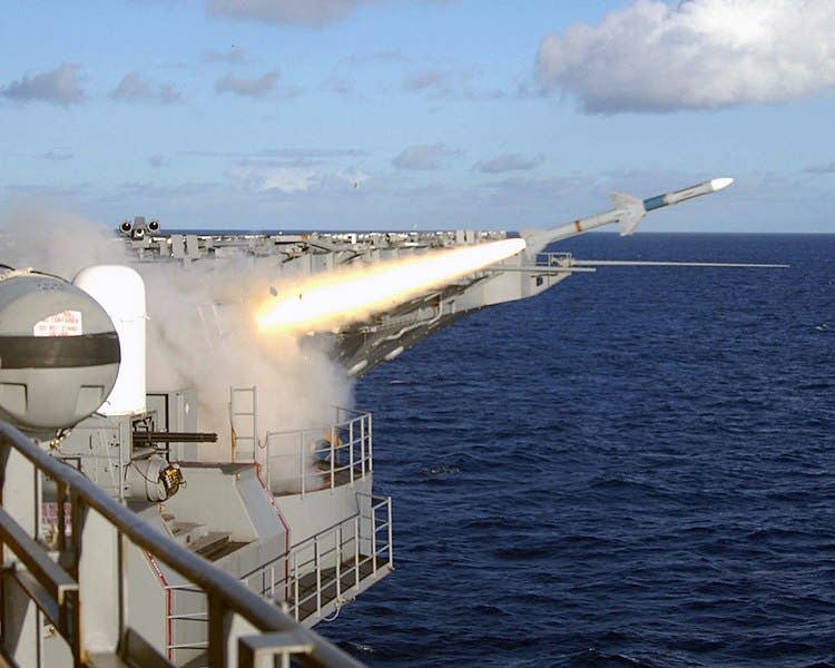 At sea aboard USS Theodore Roosevelt (CVN 71) -- One of the ship’s “Sea Sparrow” RIM-7 surface-to-air missiles launches during a training exercise. (U.S. Navy photo)