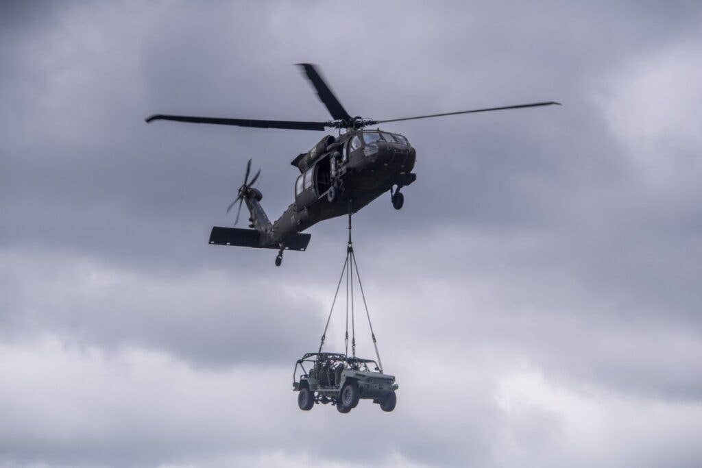 <em>The ISV is light enough to be slung under a UH-60 Blackhawk during air assaults (U.S. Army)</em>