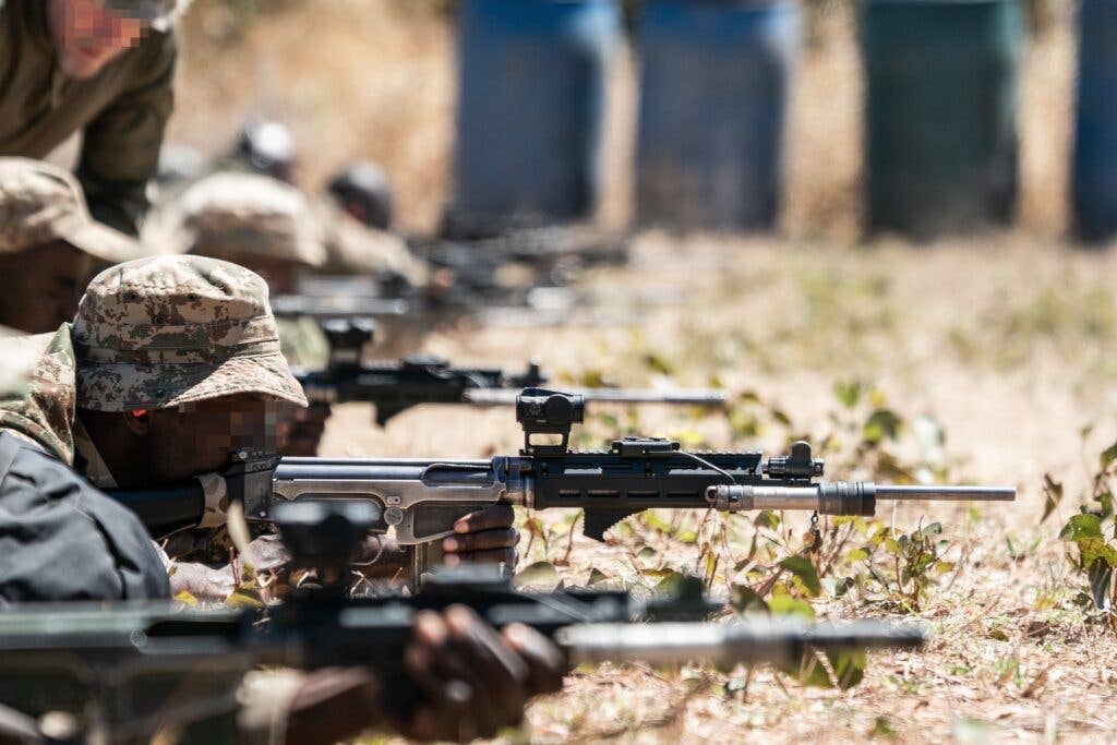 <em>Eco Defense Group trains and equips Rangers to have an edge over poachers (Eco Defense Group)</em>