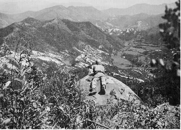 A US 1st Cavalry Division observation post overlooks Hill 518, held by the North Koreans north of Waegwan. September 1950, during the Korean War. (Wikimedia Commons)