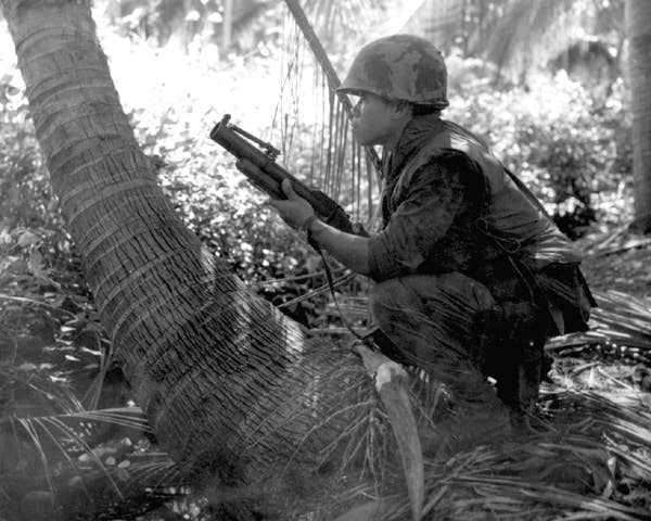 Soldiers of the Royal Thai Army Volunteer Regiment (Queen's Cobras) conduct a search and sweep mission in Phuoc Tho. 1967. (Wikimedia Commons)