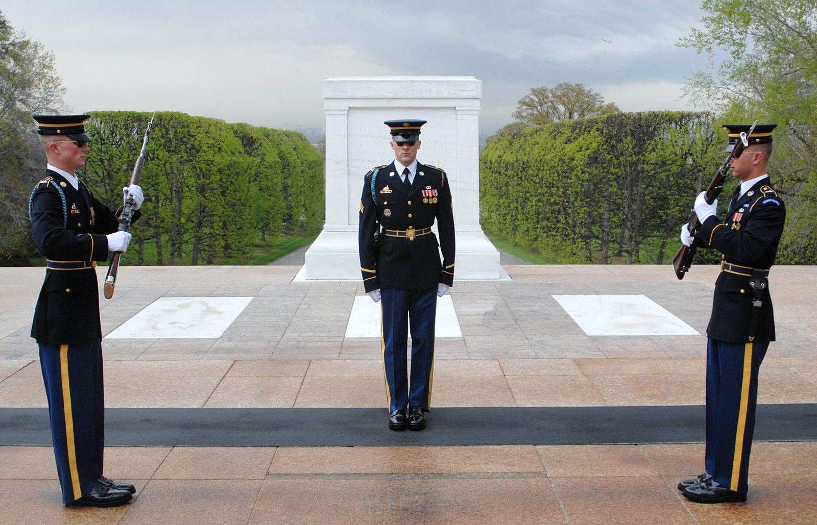 Sgt. Benton Thames, Sgt. Jeff Binek and Spc. William Johnson change the guard at the Tomb of the Unknowns. The ceremony is full of tradition and meaning. For example, sentinels take 21 steps or stand for 21 seconds—honoring the unknowns with a version of the 21-gun salute. Wikimedia Commons.
