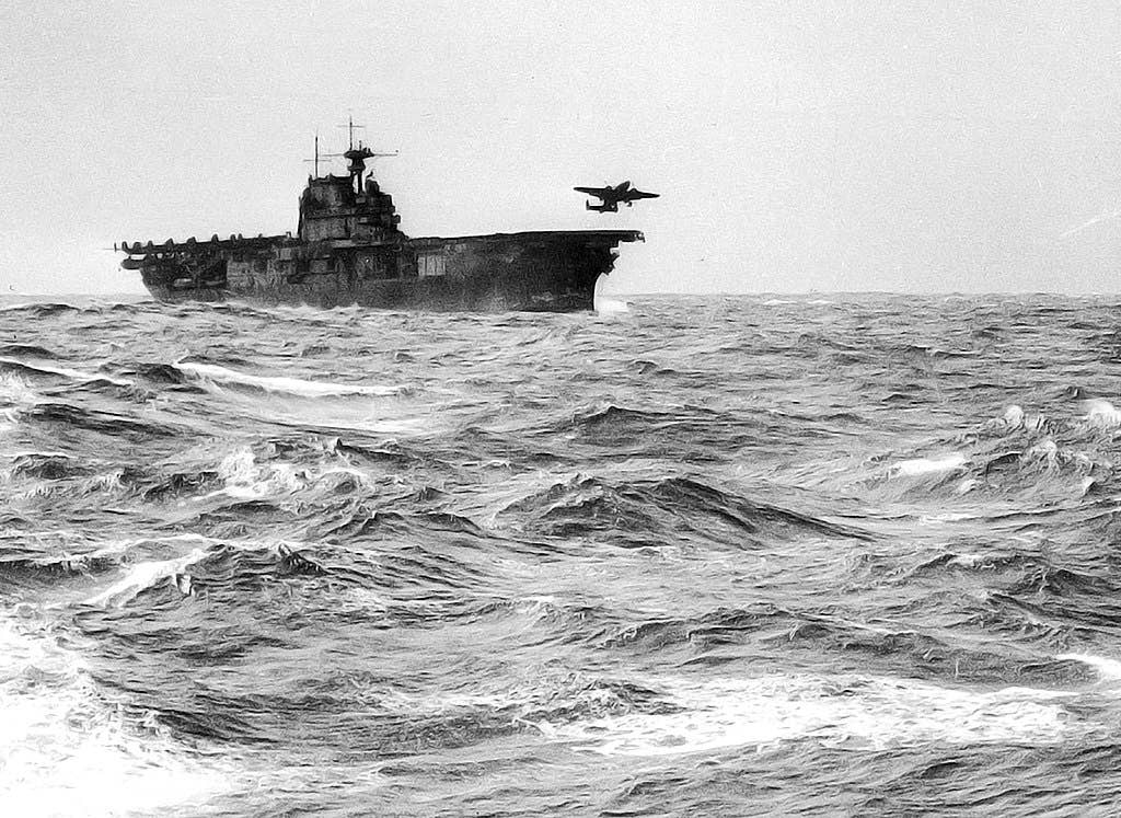 A U.S. Army Air Force B-25B Mitchell medium bomber, one of 16 involved in the Doolittle Raid, takes off from the flight deck of the USS Hornet for an air raid on Japan, April 18, 1942. (U.S. Army Air Force)