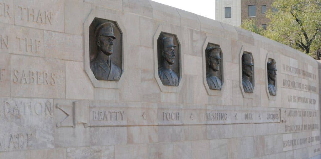 <em>The dedication wall features bronze reliefs of the five allied commanders who attended the groundbreaking <em>(<em>National WWI Museum and Memorial)</em></em></em>
