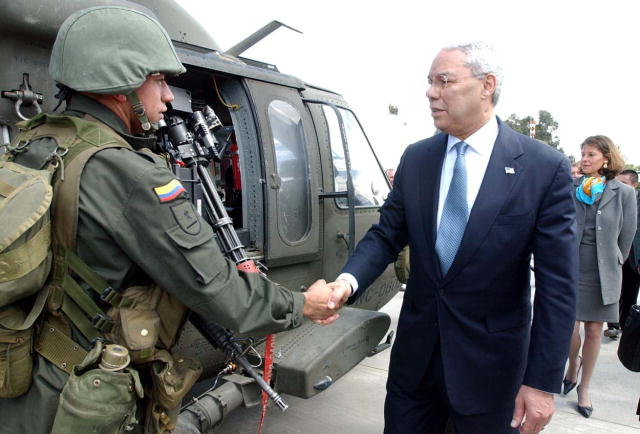 Powell meets with a soldier in Colombia. Wikimedia Commons.