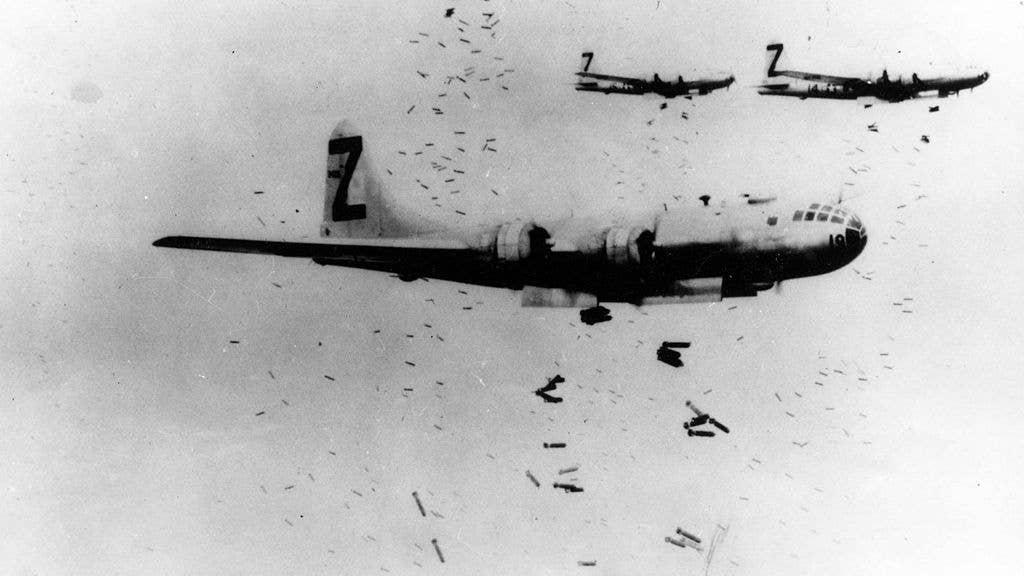 B-29 Superfortress bombers dropping incendiary bombs on Yokohama during May 1945. (U.S. Air Force)
